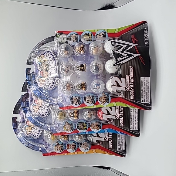 2012 WWE Squinkies 3 Series The Rock, Jake the Snake, Stone Cold Steve Austin - Picture 1 of 14